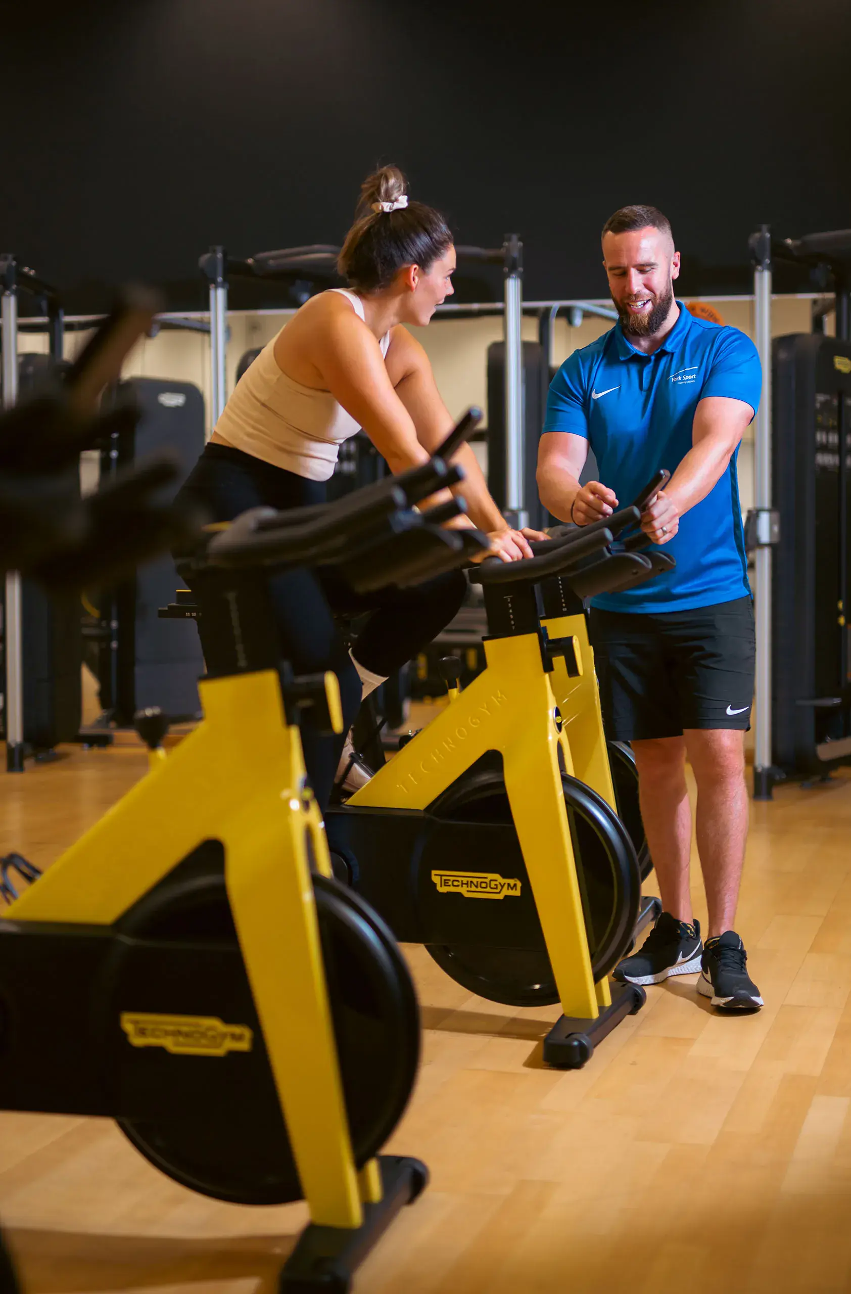 Trainer and trainee discuss their achievements